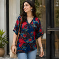 Sapphire Petal Statement Top